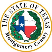 Montgomery County Texas government logo featuring the Texas state flag inside the Texas outline, surrounded by a laurel wreath and the text 'THE STATE OF TEXAS Montgomery County'.